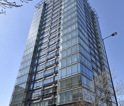A modern glass fronted high rise apartment building