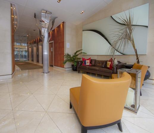 The modern lobby area of a high rise apartment block